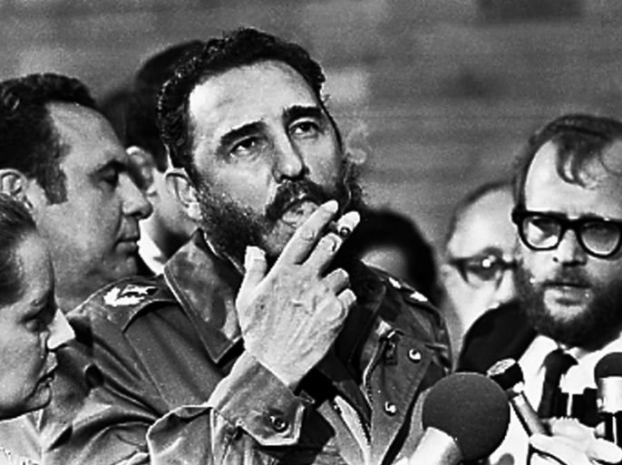 Then Cuban Prime Minister Fidel Castro smokes a cigar during interviews with the press during a visit of U.S. Senator Charles McGovern, in Havana in this May 1975 file photo. REUTERS/Prensa Latina/File Photo