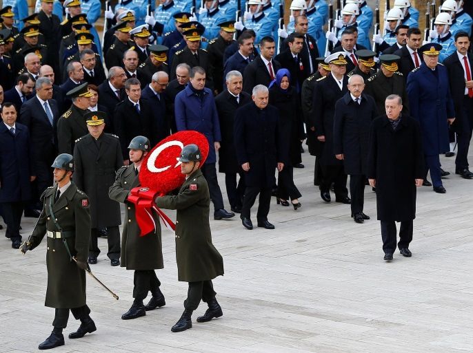 Turkish President Tayyip Erdogan attends a ceremony as he is flanked by top officials and army officers at the mausoleum of Mustafa Kemal Ataturk, marking Ataturk's death anniversary, in Ankara, Turkey, November 10, 2016. REUTERS/Umit Bektas