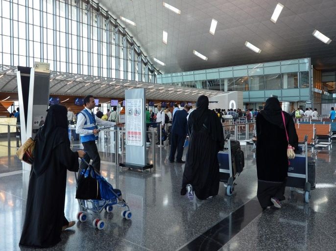 Qatari guests walk through after soft opening the Hamad International Airport (HIA) in Doha, Qatar, 30 April 2014. The new airport, established over 600,000 square meters with the cost of over 15.5 billion US dollars, is expected to be capable of handling some 50 million passengers a year by 2015.