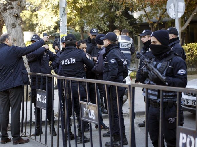 Turkish police secures the area in front of the headquarters of the Turkish Peoples' Democratic Party (HDP) during an operation in Ankara, Turkey, 04 November 2016. Co-leaders of the pro-Kurdish and pro-minority political party Peoples' Democratic Party (HDP) Figen Yuksekdag and Selahattin Demirtas were detained, along with at least other nine members of parliament (MPs), as part of a counter-terrorism investigation following a police raid in the HDP party headquarter