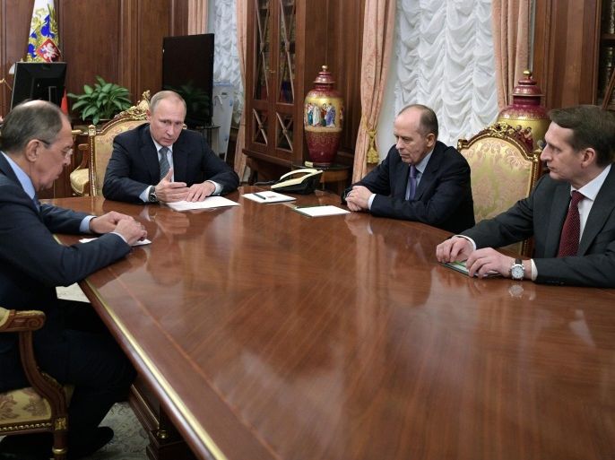 Russian President Vladimir Putin (C), Foreign Minister Sergei Lavrov (L) director of the Foreign Intelligence Service (SVR) Sergei Naryshkin (R) and Alexander Bortnikov (2nd-R) director of the Federal Security Service (FSB), during a meeting at the Kremlin in Moscow, Russia, 19 December 2016. Russia's ambassador to Turkey, Andrey Karlov, has been shot at an art exhibition in the Turkish capital of Ankara. Karlov has died of his wounds after the attack, Russia's Minis