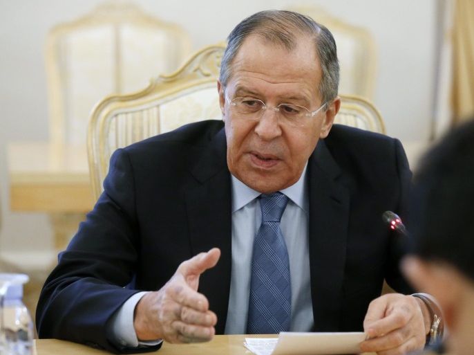 Russian Foreign Minister Sergei Lavrov (L) talks to his Japanese counterpart Fumio Kishida (R, back to camera) during their meeting in the Foreign Ministry's guest house in Moscow, Russia, 03 December 2016. The two ministers met to prepare the Russian President's planned visit to Japan.