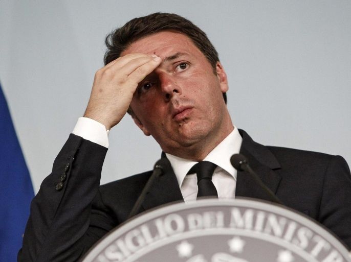 (FILE) A file picture dated 15 June 2016 shows Italian Prime Minister Matteo Renzi during a press conference after the Council of Ministers meeting at Chigi Palace in Rome, Italy. Matteo Renzi has announced his resignation after exit polls on 04 December 2016 suggest a 'No' vote victory in a crucial referendum to which Renzi had tied his political future. The referendum is considered by the government to end gridlock and make passing legislation cheaper by, among other things, turning the Senate into a leaner body made up of regional representatives with fewer lawmaking powers. It would also do away with the equal powers between the Upper and Lower Houses of parliament - an unusual system that has been blamed for decades of political gridlock. EPA/GIUSEPPE LAMI *** Local Caption *** 52828024