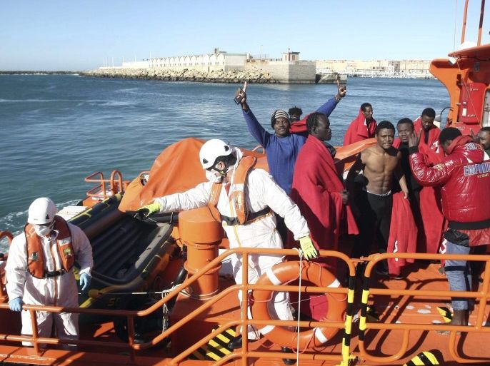 A group of ten Sub-Saharan immigrants arrive to the port of Tarifa after being rescued by Spanish Maritime Rescue Forces in the Strait of Gibraltar when they were trying to reach Spanish territory on board a small boat, in Tarifa, province of Cadiz, southern Spain, 17 November 2016.