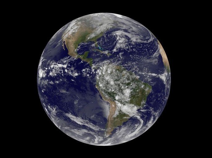 A handout satellite image provided by NASA / NOAA shows planet Earth with a view of the Americas, 22 April 2014. The image was produced by geostationary GOES satellites, which are always in the same position with respect to the rotating Earth. According to NASA, this allows GOES to hover continuously over one position on Earth's surface, appearing stationary. As a result, GOES provide a constant vigil for severe weather conditions such as tornadoes, flash floods, hail