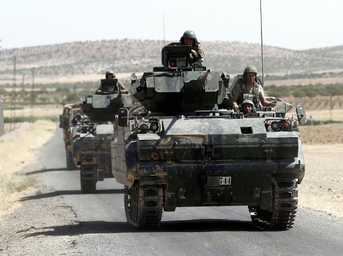 Turkish soldiers with tanks return from Syria to Turkey after a military operation at the Syrian border as part of their offensive against the Islamic State (IS) militant group in Syria, Karkamis district of Gaziantep, Turkey, 27 August 2016. The Turkish army launched an offensive operation against IS in Syria's Jarablus with its war jets and army troops in coordination with the US led coalition war planes.