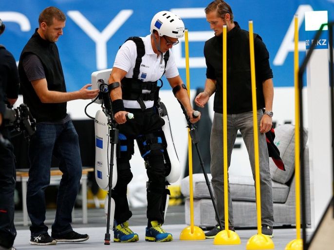 Philipp Wipfli of Switzerland competes during the Powered Exoskeleton Race at the Cybathlon Championships in Kloten, Switzerland October 8, 2016. REUTERS/Arnd Wiegmann