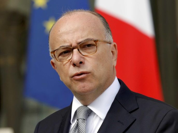 French Interior Minister Bernard Cazeneuve speaks in the Elysee Palace courtyard in this picutre taken August 11, 2016 in Paris, France. Picture taken August 11, 2016. REUTERS/Philippe Wojazer/File Photo