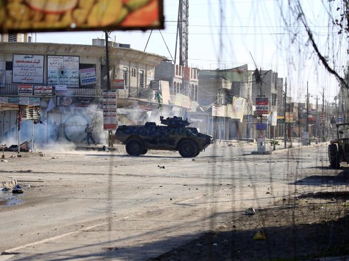 Iraqi rapid response forces clash with Islamic State militants in eastern Mosul, Iraq, January 11, 2017. REUTERS/Alaa Al-Marjani