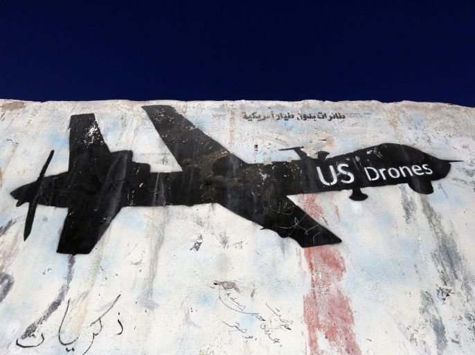 A wall with a graffiti protesting US drone operations in war-affected Yemen, at a street in Sana'a, Yemen, 24 December 2016. According to reports, the US Central Command allegedly conducted nine drone attacks targeting the al-Qaeda in the Arabian Peninsula (AQAP) militants in Yemen since September 2016, killing 28 militants.