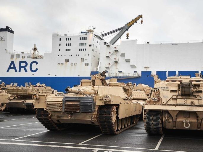 Military vehicles that left the cargo stay in the habour in Bremerhaven, northern Germany, 06 January 2017. More than 2,500 tanks, trucks and other vehicles of the US Army will be handled in Bremerhaven during what is the biggest troop transfer from the US to Europe since the end of the Soviet Union. The US equipment will be transported to Poland on some 900 railway waggons for the military excercise 'Atlantic Resolve'.