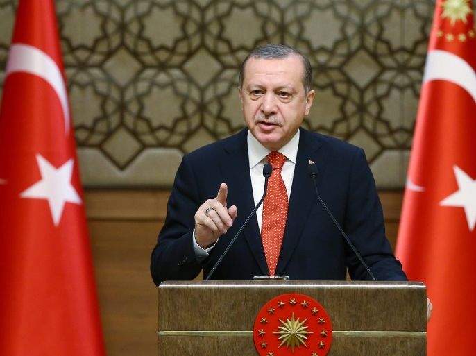 A handout photo made available by the Turkish President Press office shows, Turkish President Recep Tayyip Erdogan speaking during 33rd mukhtars (local officials) meeting in Ankara, Turkey, 04 January 2017. Erdogan spoke of Turkey's ongoing operation to gain control of the northern Syrian town of Al-Bab. EPA/TURKISH PRESIDENT PRESS OFFICE / HANDOUT