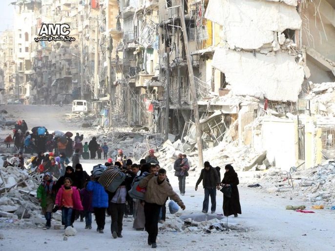 A handout picture made available by Aleppo Media Center (AMC) shows displaced Syrian families leave the neighborhoods where the fighting occurs in eastern Aleppo, Syria, 29 November 2016. According to AMC 53 Syrians died on the same day due to air and bomb strikes on neighborhoods in the eastern part of Aleppo. According to the United Nations (UN) about 16 thousand people were displaced in Aleppo since the fight started between the rebels and the regime on 15 November 2