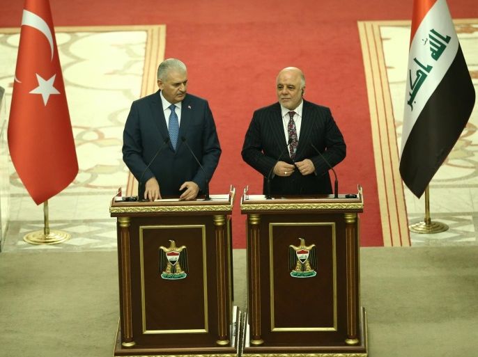 Turkey's Prime Minister Binali Yildirim and his Iraqi counterpart Haider al-Abadi hold a joint news conference in Baghdad, Iraq, January 7, 2017. Hakan Goktepe/Prime Minister's Press Office/Handout via REUTERS ATTENTION EDITORS - THIS PICTURE WAS PROVIDED BY A THIRD PARTY. FOR EDITORIAL USE ONLY. NO RESALES. NO ARCHIVE.