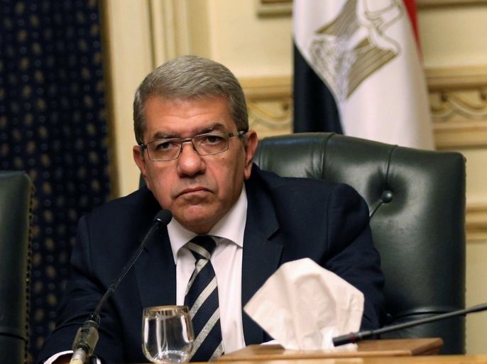 Egypt's Finance Minister Amr El-Garhy attends a news conference in Cairo, Egypt August 11, 2016. Picture taken August 11, 2016. REUTERS/Mohamed Abd El Ghany