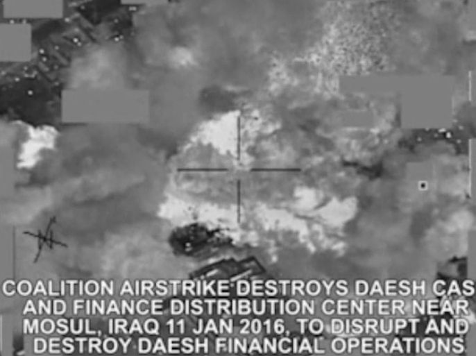 A DVIDS handout made available on 16 January 2016 shows an image taken from a video screen grab of a coalition airstrike destroying a ISIS cash and finance distribution center near Mosul, Iraq, on 11 January 2016, to disrupt and destroy ISIS financial operations. The strikes were conducted as part of Operation Inherent Resolve, the operation to eliminate the ISIS terrorist group and the threat they pose to Iraq, Syria, and the wider international community. EPA/DVIDS /