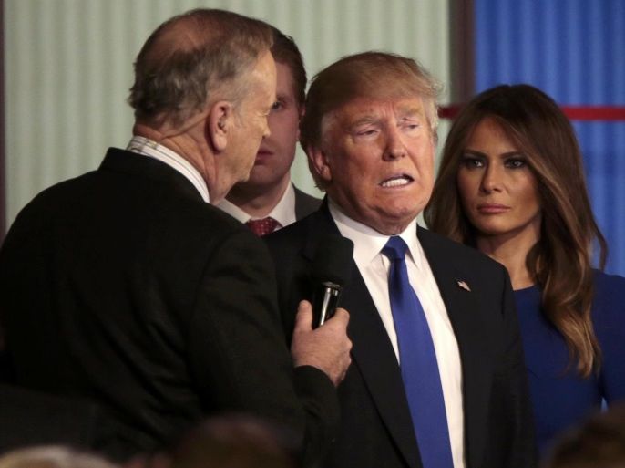 Republican U.S. presidential candidate Donald Trump (C) is interviewed by Fox News talk show host Bill O'Reilly (L) as Trump's wife Melania (R) looks on at the conclusion of the U.S. Republican presidential candidates debate in Detroit, Michigan, March 3, 2016. REUTERS/Rebecca Cook