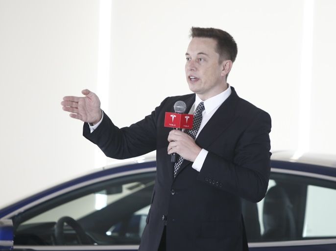 BEIJING, CHINA - OCTOBER 23: (CHINA OUT) Elon Musk, Chairman, CEO and Product Architect of Tesla Motors, addresses a press conference to declare that the Tesla Motors releases v7.0 System in China on a limited basis for its Model S, which will enable self-driving features such as Autosteer for a select group of beta testers on October 23, 2015 in Beijing, China. The v7.0 system includes Autosteer, a new Autopilot feature. While it's not absolutely self-driving and the