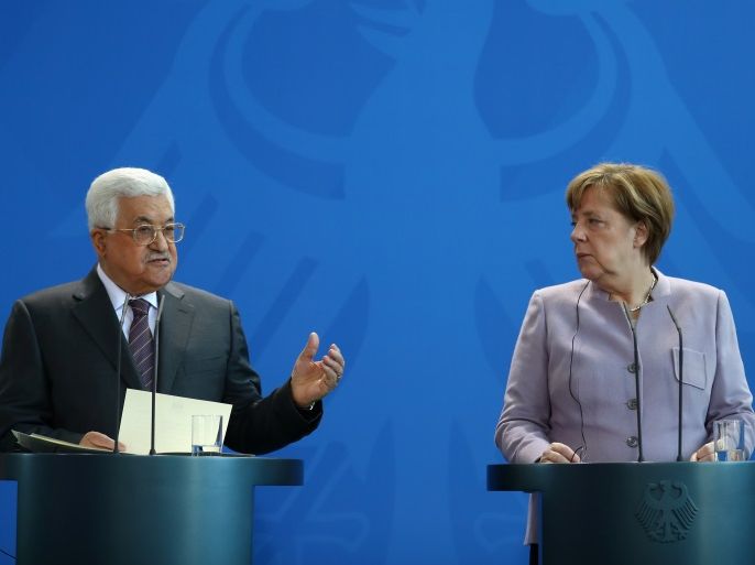 German Chancellor Angela Merkel and Palestinian President Mahmoud Abbas give a statement in Berlin, Germany, March 24, 2017. REUTERS/Pawel Kopczynski