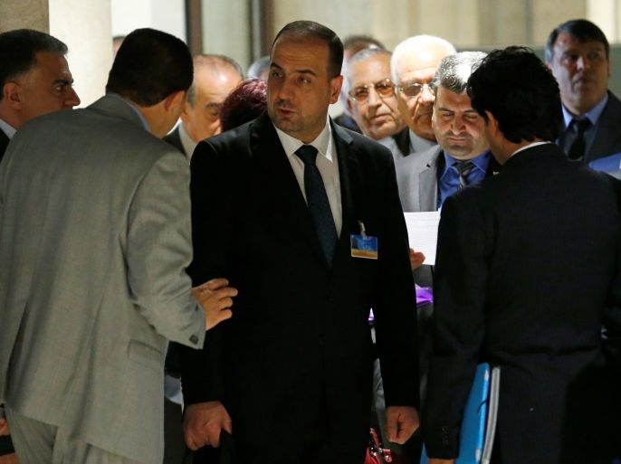Nasr al-Hariri (C), chief negotiator of the Syrian High Negotiations Committee (HNC) opposition group, arrives with the delegation for a meeting with UN Special Envoy of the Secretary-General for Syria Staffan de Mistura prior to a round of negotiations, during the Intra-Syrian talks, at the European headquarters of the United Nations in Geneva, Switzerland March 24, 2017. REUTERS/Denis Balibouse
