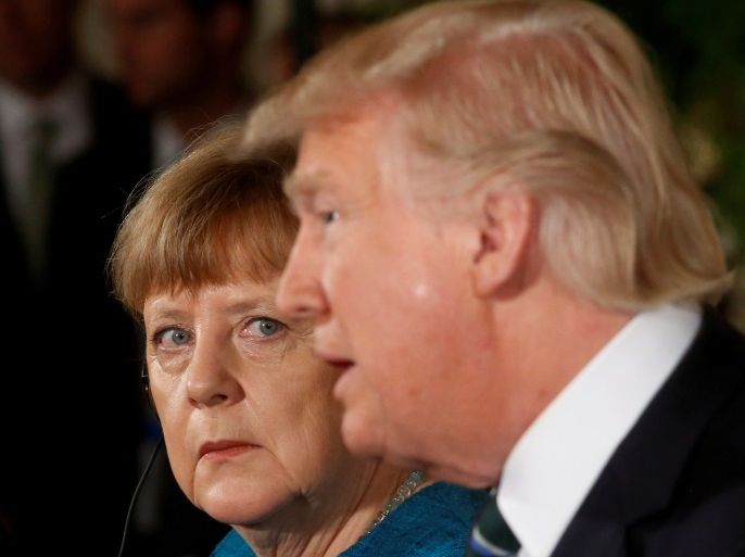 Germany's Chancellor Angela Merkel and U.S. President Donald Trump hold a joint news conference in the East Room of the White House in Washington, U.S., March 17, 2017. REUTERS/Jonathan Ernst TPX IMAGES OF THE DAY