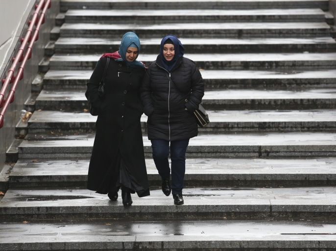 VIENNA, AUSTRIA - DECEMBER 01: Women wearing headscarves walk on the street on December 1, 2016 in Vienna, Austria. Polls indicate that right-wing populist presidential candidate Norbert Hofer has a strong chance of winning presidential elections scheduled for December 4. Hofer has in his campaign rhetoric warned of criminal immigrants and stated that Islam shall not be a part of Austria. He has also courted right-wing media and openly worn the cornflower, an early-20th