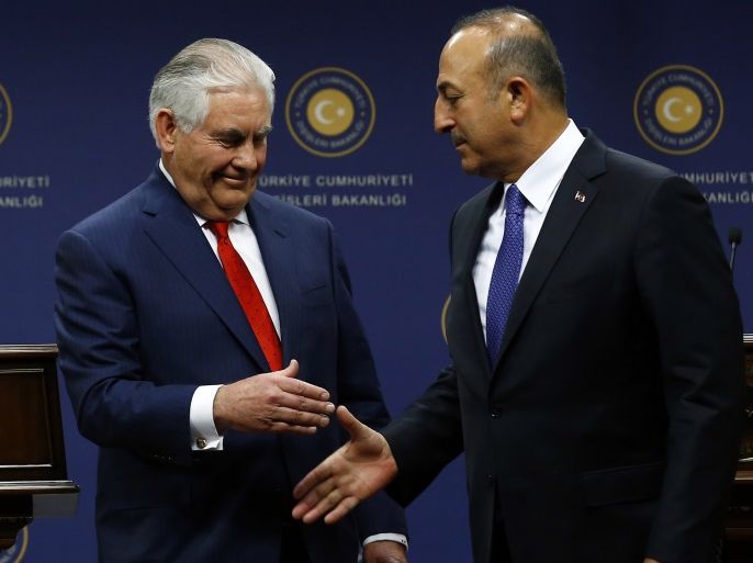 U.S. Secretary of State Rex Tillerson shakes hands with Turkish Foreign Minister Mevlut Cavusoglu during a news conference in Ankara, Turkey, March 30, 2017. REUTERS/Umit Bektas