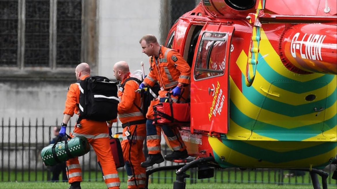 epa05863961 An air ambulance on Parliament Square following a major incident outside the Houses of Parliament in central London, Britain 22 March 2017. Scotland Yard said on 22 March 21017 the police were called to a firearms incident in the Westminister palace grounds and on Westminster Bridge amid reports of at least two people killed and several other people injured in central London. EPA/ANDY RAIN