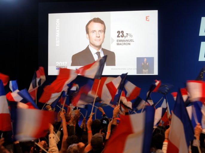 PARIS, FRANCE - APRIL 23: A screen announces the results of the first round of the French Presidential Elections naming Founder and Leader of the political movement 'En Marche !' Emmanuel Macron with 23.7% of the vote at Parc des Expositions Porte de Versailles on April 23, 2017 in Paris, France. Macron and National Front Party Leader Marine Le Pen will compete in the next round of the French Presidential Elections on May 7 to decide the next President of France. (