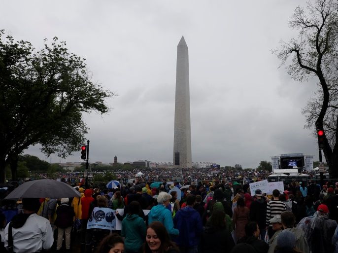 Demonstrators gather at the Washington Monument before marching to the U.S. Capitol during the March for Science in Washington, U.S., April 22, 2017. REUTERS/Aaron P. Bernstein