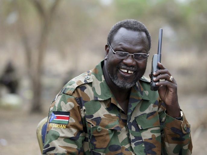 South Sudan's rebel leader Riek Machar talks on the phone in his field office in a rebel-controlled territory in Jonglei State, South Sudan, February 1, 2014. REUTERS/Goran Tomasevic/File Photo TPX IMAGES OF THE DAY