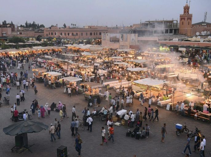 A general view of Marrakesh?s famous Jemma el-Fnaa square, June 25, 2012. An Islamist bombing of a cafe last year hurt trade for the snake charmers and trinket sellers who entice foreign tourists to the Jamaa el-Fna square, but the euro zone debt crisis risks doing far more lasting damage to business.Tourists from western Europe typically account for more than 70 percent of all visitors annually to Morocco, where total visitor numbers fell 10 percent in the first quarter of 2012 from a year earlier, according to official data. Picture taken June 25, 2012. To match story MOROCCO-ECONOMY/TOURISM REUTERS/Abderrahmane Mokhtari (MOROCCO - Tags: TRAVEL SOCIETY BUSINESS CITYSPACE)