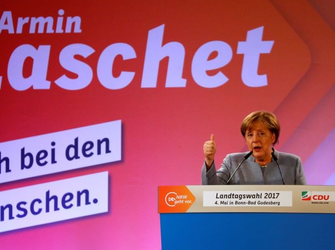 Bonn, Germany - 04/05/2017 - German Chancellor Angela Merkel speaks at an election rally. REUTERS/Wolfgang Rattay