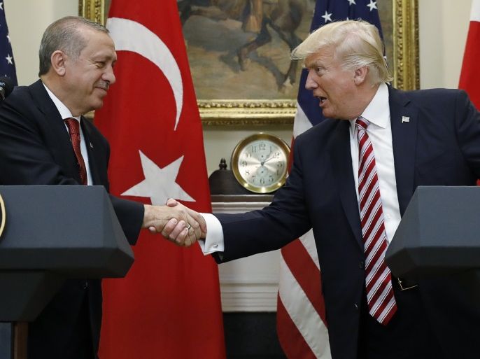 Turkey's President Recep Tayyip Erdogan (L) shakes hands with U.S President Donald Trump as they make statements to reporters in the Roosevelt Room of the White House in Washington, U.S. May 16, 2017. REUTERS/Kevin Lamarque