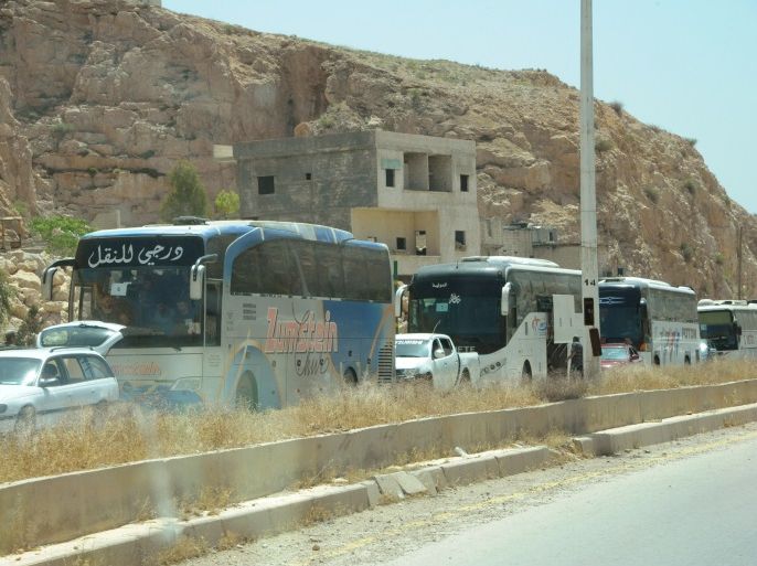 A view shows a convoy of buses carrying rebel fighters and their relatives from the besieged Damascus district of Barzeh, in this handout picture provided by SANA on May 8, 2017, Syria. SANA/Handout via REUTERS ATTENTION EDITORS - THIS PICTURE WAS PROVIDED BY A THIRD PARTY. REUTERS IS UNABLE TO INDEPENDENTLY VERIFY THE AUTHENTICITY, CONTENT, LOCATION OR DATE OF THIS IMAGE. FOR EDITORIAL USE ONLY.