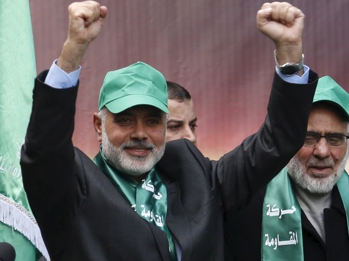 Senior Hamas leader Ismail Haniyeh gestures to the crowd as he takes part in a rally marking the 28th anniversary of Hamas' founding, in Gaza City December 14, 2015. REUTERS/Suhaib Salem
