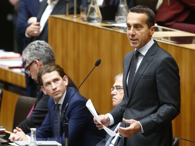 Austria's Chancellor Christian Kern (R) delivers a speech as Foreign Minister Sebastian Kurz watches during a session of the parliament in Vienna, Austria, May 16, 2017. REUTERS/Leonhard Foeger