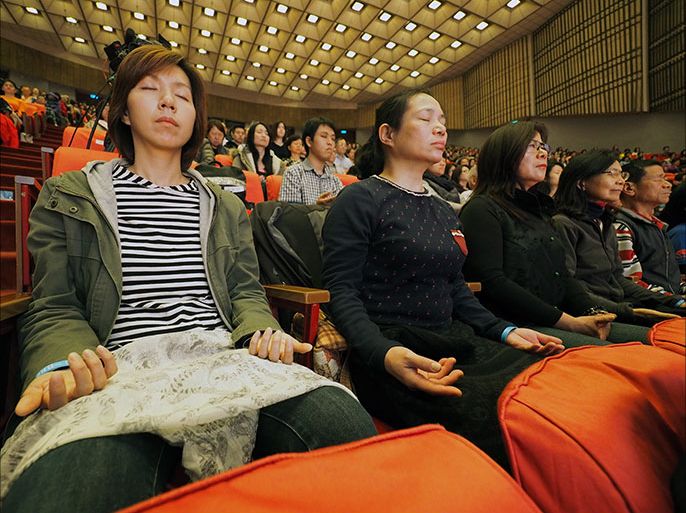 epa05870217 People learn how to relax at a training camp held by John D. Young, chairman of the Chang Gung Biotechnology Corp, in Taipei, Taiwan, 25 March 2017. The camp is to teach people how to find the self and develop their full potential by living in the Here and Now. Young has written several books and gives lectures to encourage people to shed the bounds of the modern world and find the true self and happiness. Many Taiwanese see Young as Taiwan's version of the late Indian philosopher, speaker and writer Jiddu Krishnamurti. EPA/DAVID CHANG