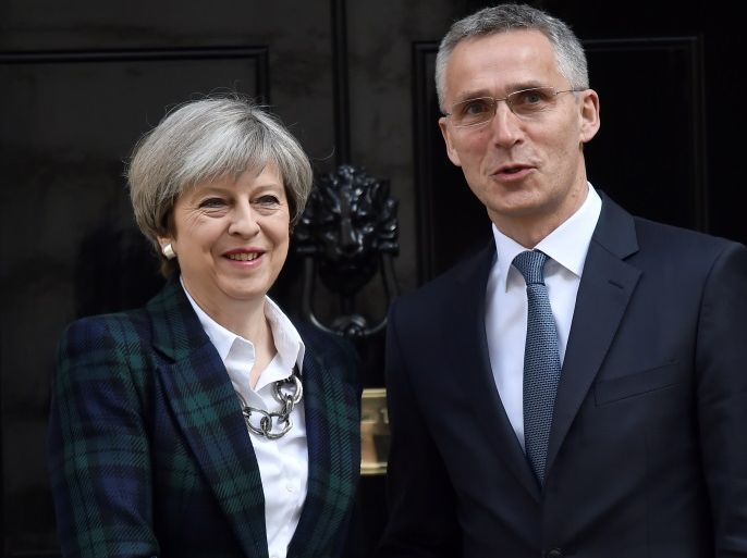 Britain's Prime Minister Theresa May greet NATO Secretary General Jens Stoltenberg outside 10 Downing Street in London, May 10, 2017. REUTERS/Hannah Mckay