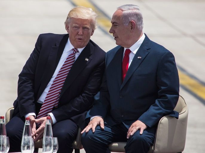 TEL AVIV, ISRAEL - MAY 22: US President Donald Trump (L) and Israeli Prime Minister Benjamin Netanyahu (R) during an official welcoming ceremony on his arrival at Ben Gurion International Airport on May 22, 2017 near Tel Aviv, Israel. This will be Trump's first visit as President to the region, and his itinerary will include meetings with the Palestinian and Israeli leaders. (Photo by Ilia Yefimovich/Getty Images)