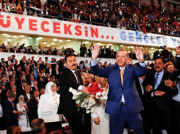 Turkish President Tayyip Erdogan, greets members of his party during the Extraordinary Congress of the ruling AK Party (AKP) in Ankara, Turkey, May 21, 2017. REUTERS/Murad Sezer