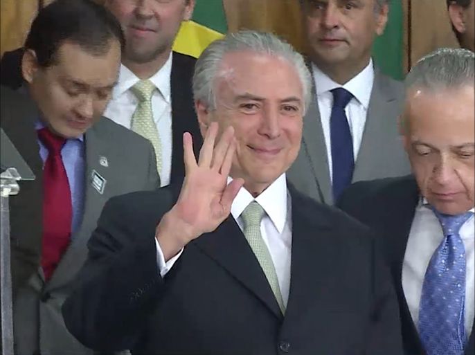 الرئيس البرازيلي ينفي موافقته على دفع رشي لرئيس البرلمان السابق مقابل الصمت في تحقيقات فساد حكومي