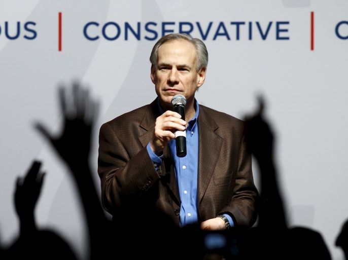 Texas Governor Greg Abbott speaks at a campaign rally for U.S. Republican presidential candidate Ted Cruz in Dallas, Texas February 29, 2016. REUTERS/Mike Stone/File Photo