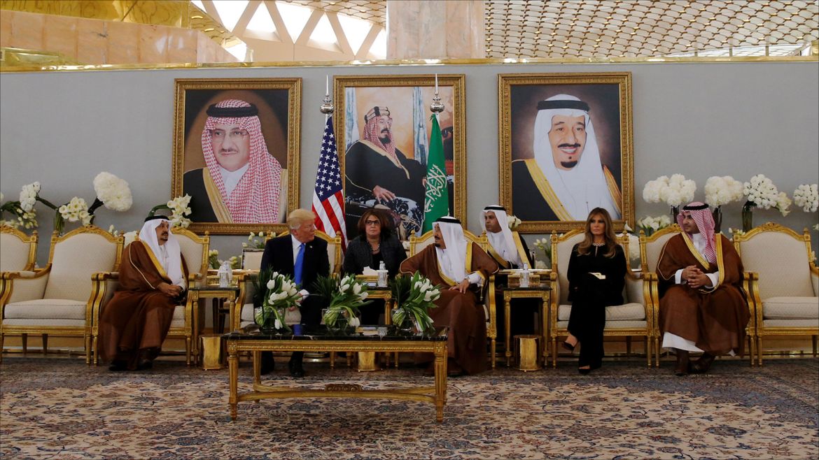 Saudi Arabia's King Salman bin Abdulaziz Al Saud (C) welcomes U.S. President Donald Trump (2nd L) with a coffee ceremony in the Royal Terminal after he arrived aboard Air Force One at King Khalid Airport International in Riyadh, Saudi Arabia May 20, 2017. REUTERS/Jonathan Ernst
