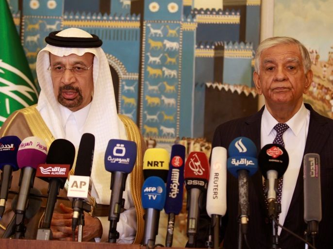 Saudi Energy Minister Khalid al-Falih (L) speaks during a media conference with Iraqi Oil Minister Jabar Ali al-Luaibi in Baghdad, Iraq, May 22, 2017. REUTERS/Khalid al Mousily
