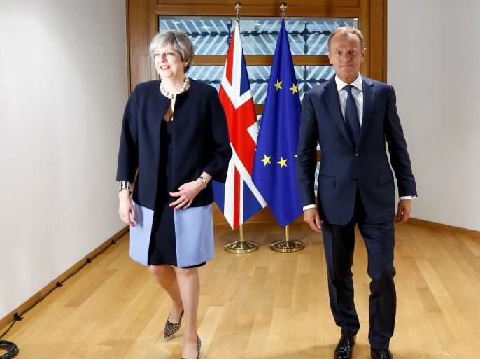 British Prime Minister Theresa May and European Council President Donald Tusk pose during a EU leaders summit in Brussels, Belgium June 22, 2017. REUTERS/Francois Lenoir