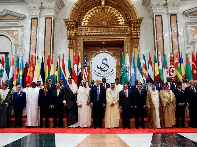 U.S. President Donald Trump, Saudi Arabia's King Salman bin Abdulaziz Al Saud, and arab leaders pose for a photo during Arab-Islamic-American Summit in Riyadh, Saudi Arabia May 21, 2017. REUTERS/Jonathan Ernst