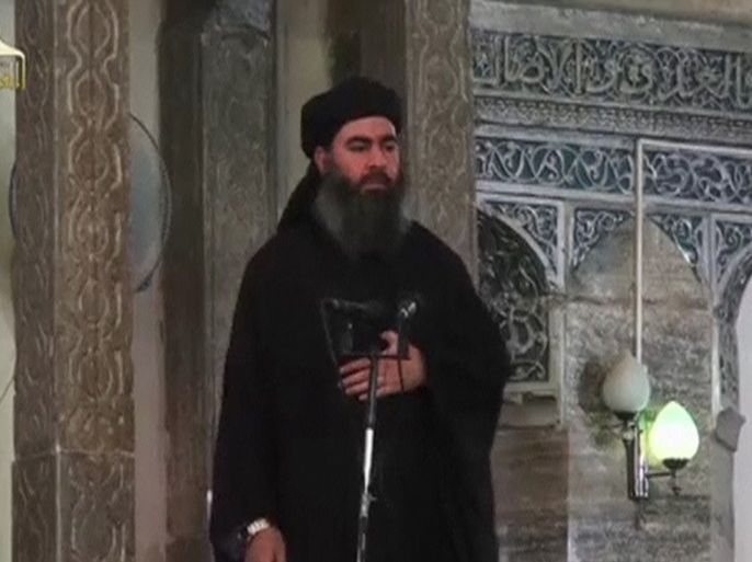 A man purported to be the reclusive leader of the militant Islamic State Abu Bakr al-Baghdadi has made what would be his first public appearance at a mosque in the centre of Iraq's second city, Mosul, according to a video recording posted on the Internet on July 5, 2014, in this still image taken from video. There had previously been reports on social media that Abu Bakr al-Baghdadi would make his first public appearance since his Islamic State in Iraq and the Levant (