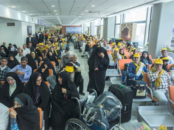 Iranian pilgrims wait at the Imam Khomeini airport in Tehran as they depart for the annual haj pilgrimage to the holy city of Mecca, in Tehran, Iran, July 31, 2017. Nazanin Tabatabaee Yazdi / TIMA via REUTERS. ATTENTION EDITORS – THIS IMAGE HAS BEEN SUPPLIED BY A THIRD PARTY.