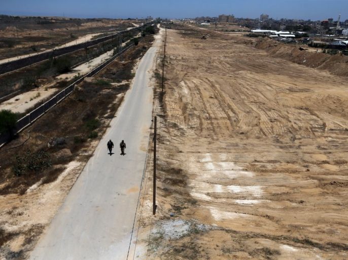 Members of Palestinian security forces loyal to Hamas patrol on border with Egypt, in Rafah, Gaza Strip June 28, 2017. REUTERS/Ibraheem Abu Mustafa
